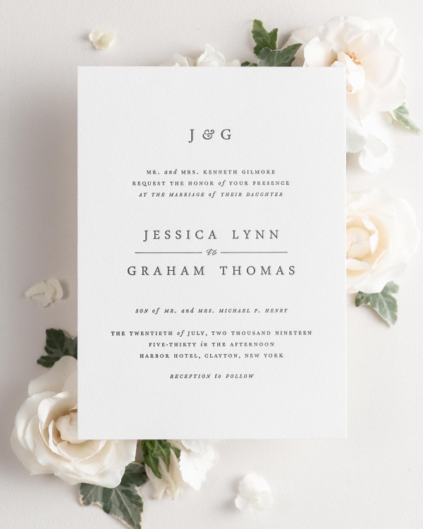 Jessica letterpress wedding invitation styled with pretty florals.