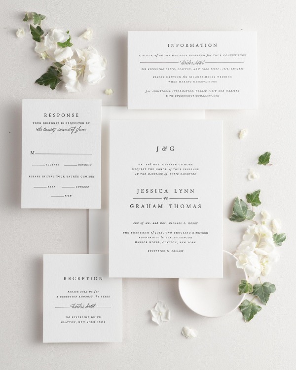 All pieces of the Jessica letterpress wedding invitation suite, including the invitation, small and large enclosures, and response card.