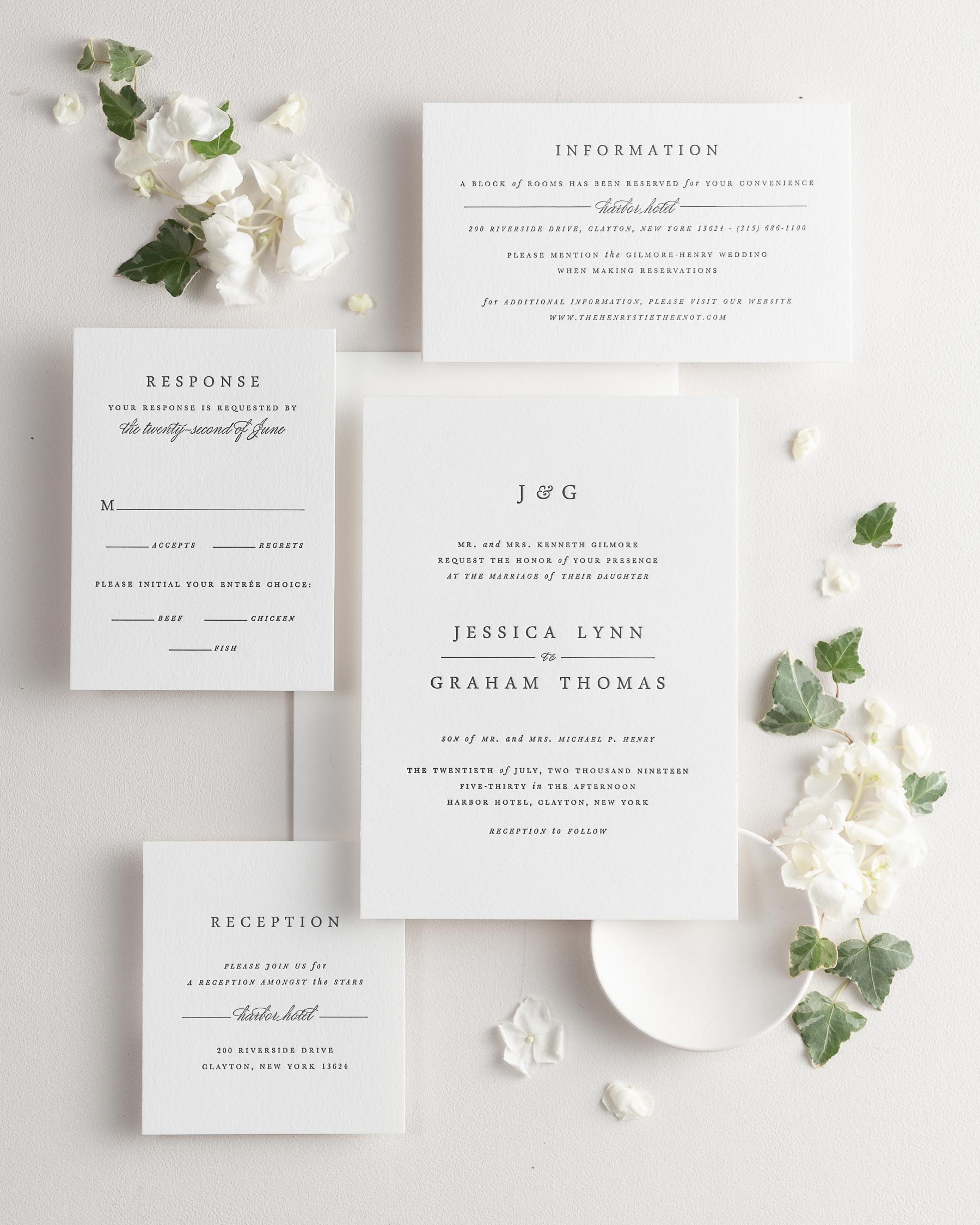 All pieces of the Jessica letterpress wedding invitation suite, including the invitation, small and large enclosures, and response card.