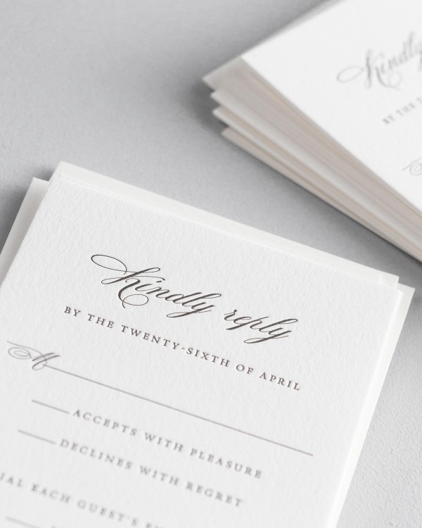 Dreamy close up shot of Kaitlyn response cards. Deep impressions in the paper are a result of the letterpress printing process.