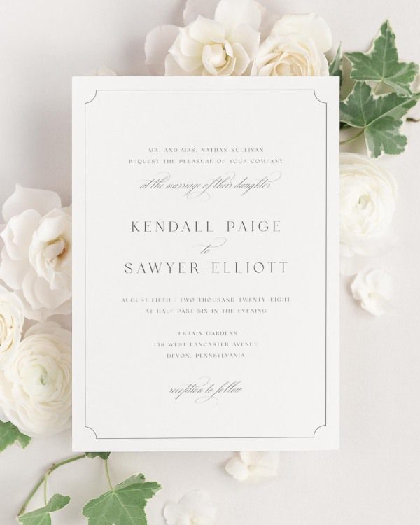 Kendall wedding invitation framed with dreamy florals.