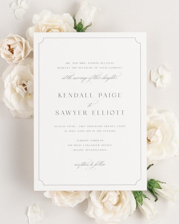 Kendall wedding invitation framed with dreamy florals.