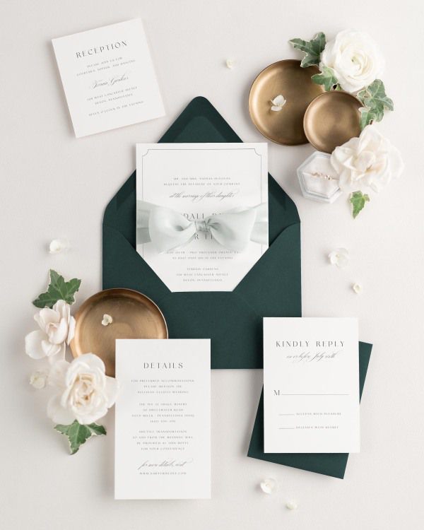 Wedding invitations with silk ribbon and green envelope
