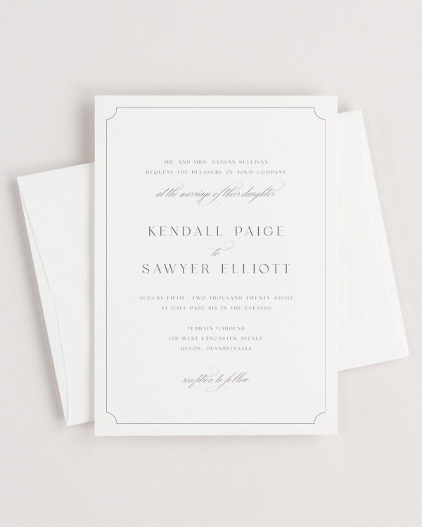 Simple close-up of Kendall invitation with an envelope.