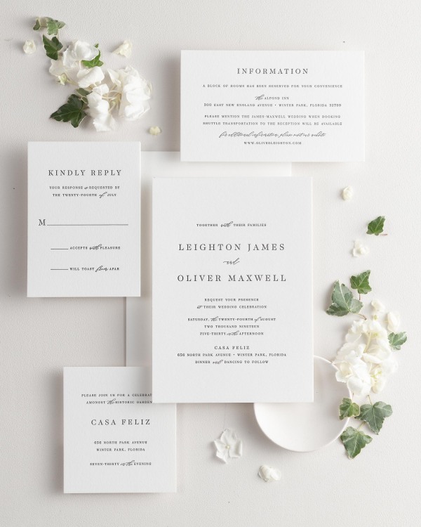 All pieces of the Leighton letterpress wedding invitation suite, including the invitation, small and large enclosures, and response card.