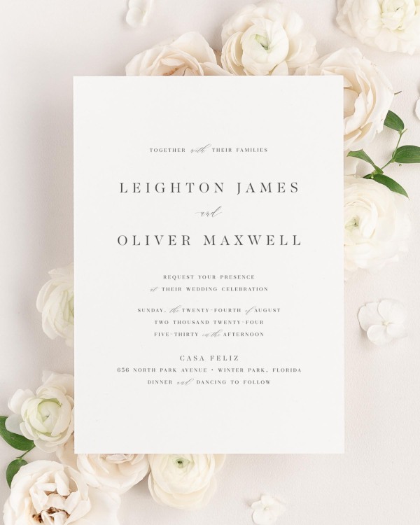 Leighton wedding invitation framed with dreamy florals.
