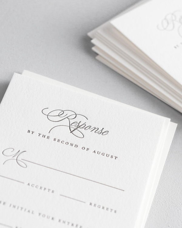 Dreamy close up shot of Liliana response cards. Deep impressions in the paper are a result of the letterpress printing process.