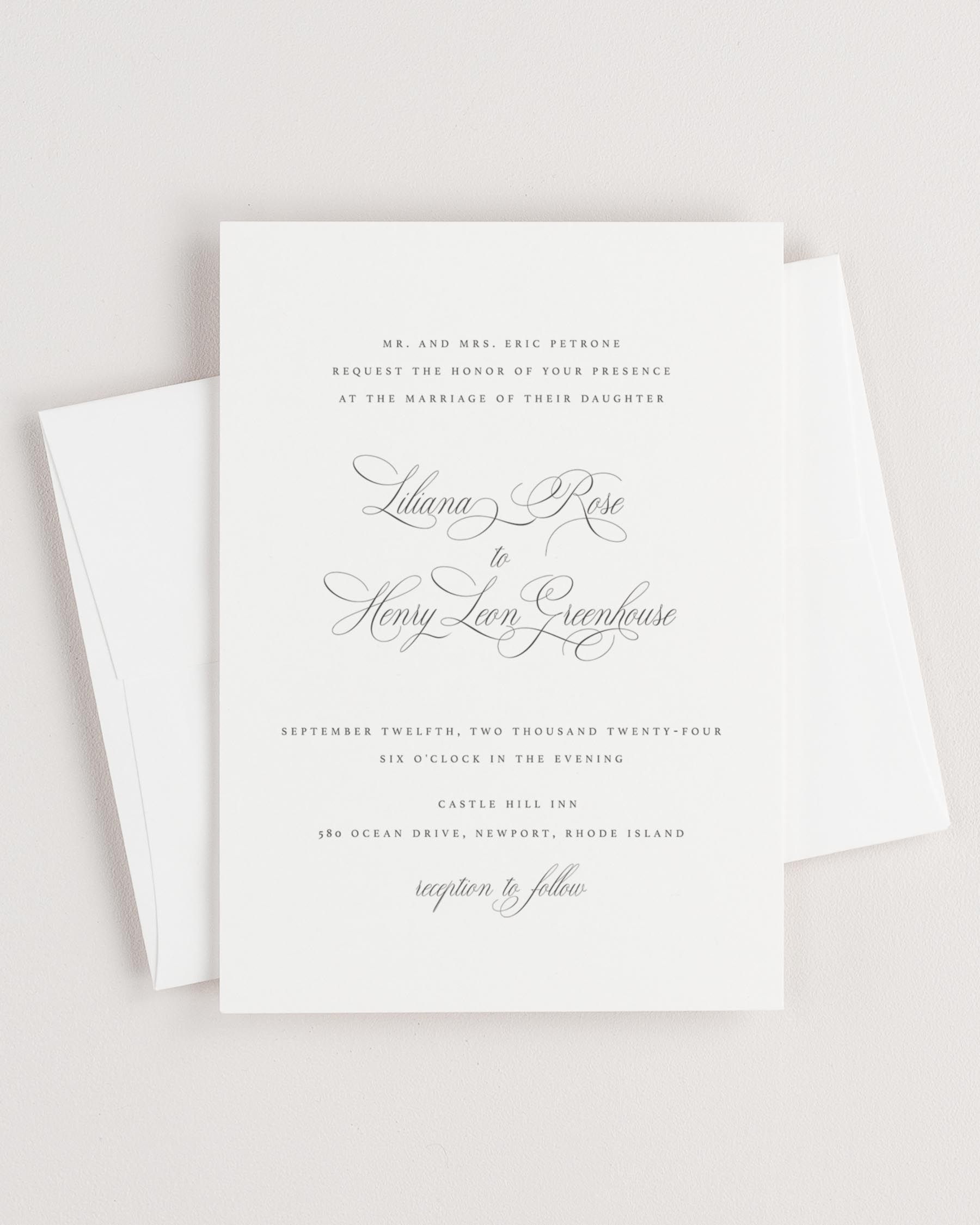 Simple close-up of Liliana invitation with an envelope.