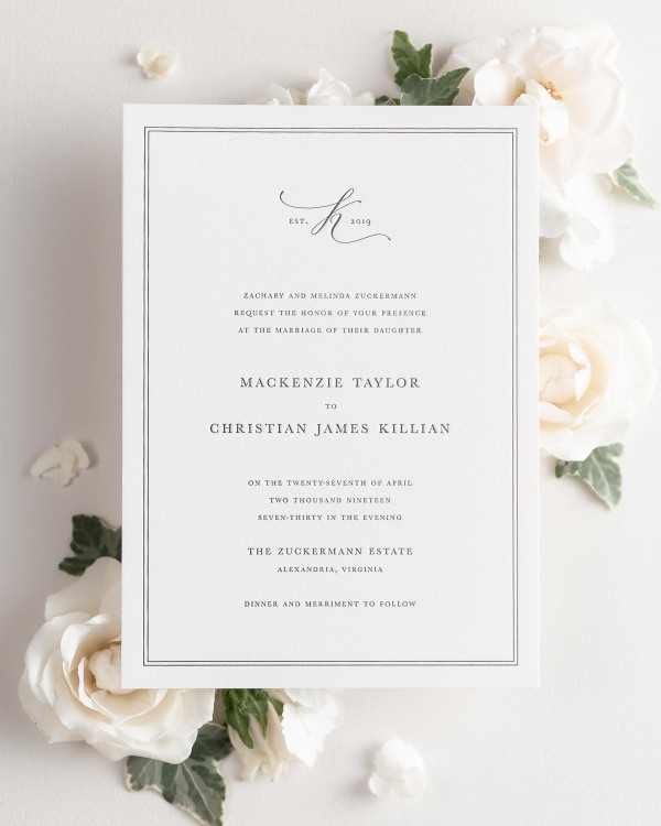 Mackenzie letterpress wedding invitation styled with pretty florals.