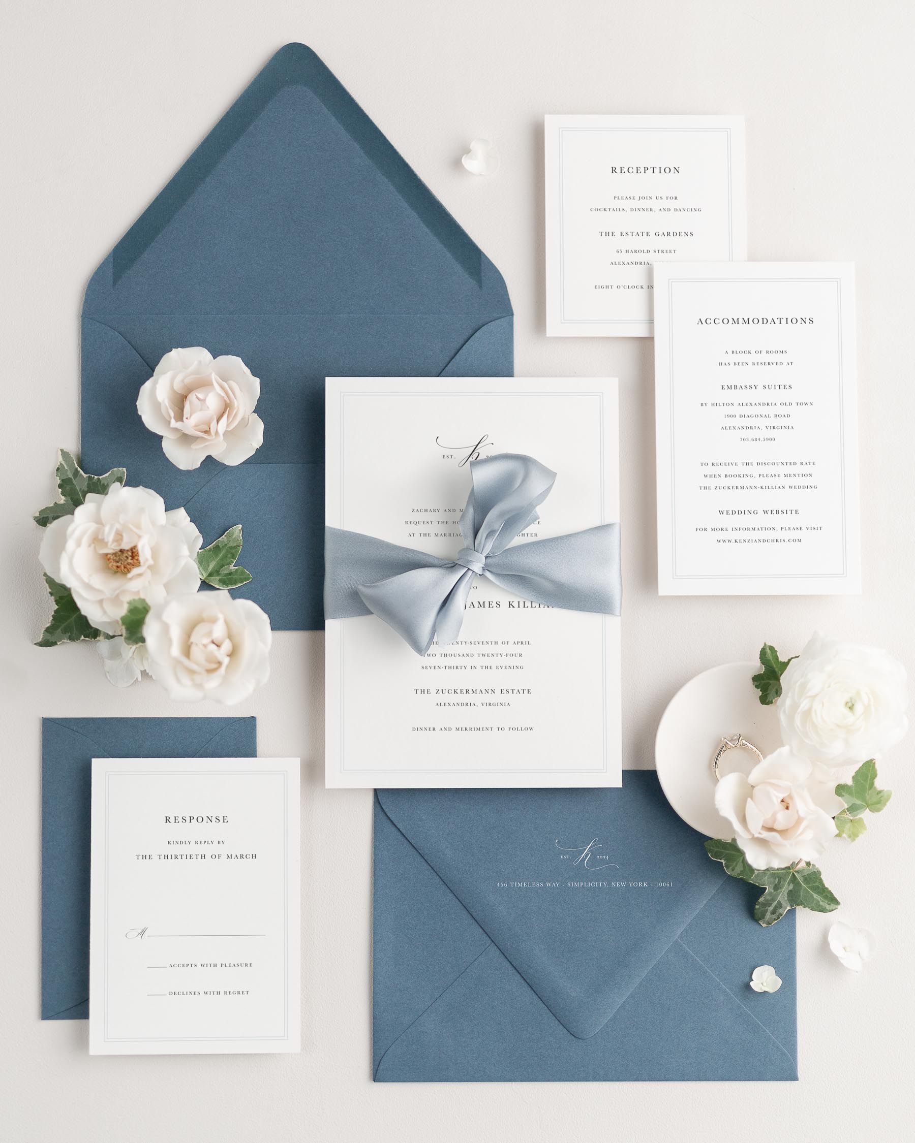 Wedding invitations with silk ribbon and chambray blue envelope