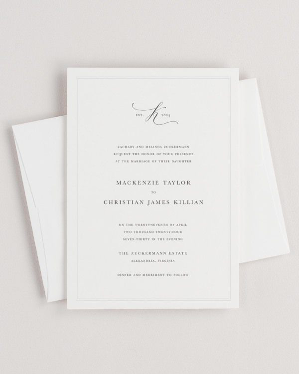 Simple close-up of Mackenzie invitation with an envelope.