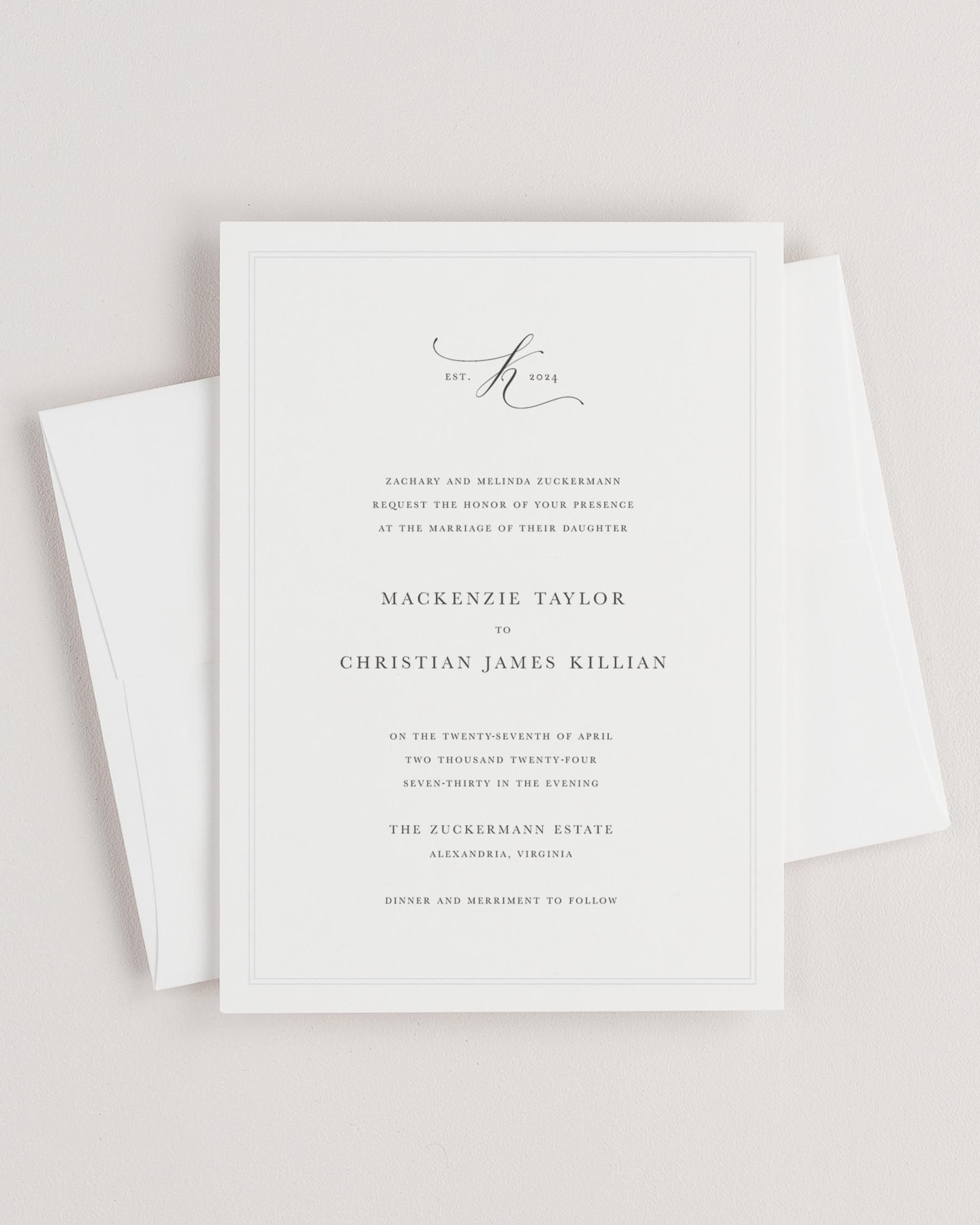 Simple close-up of Mackenzie invitation with an envelope.
