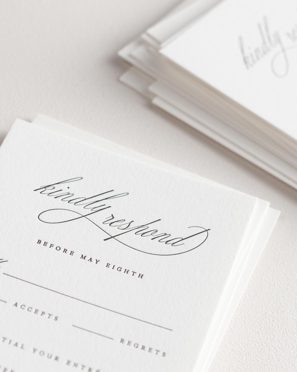 Dreamy close up shot of Nadia response cards. Deep impressions in the paper are a result of the letterpress printing process.