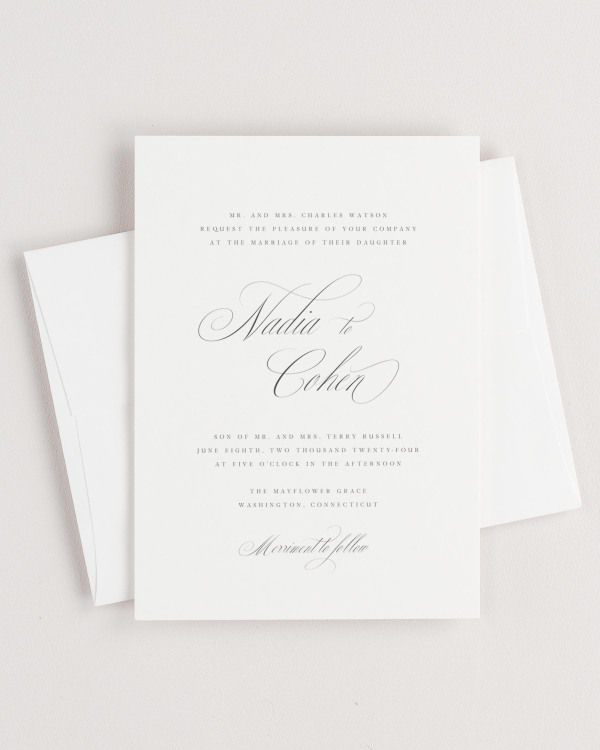Simple close-up of Nadia invitation with an envelope.
