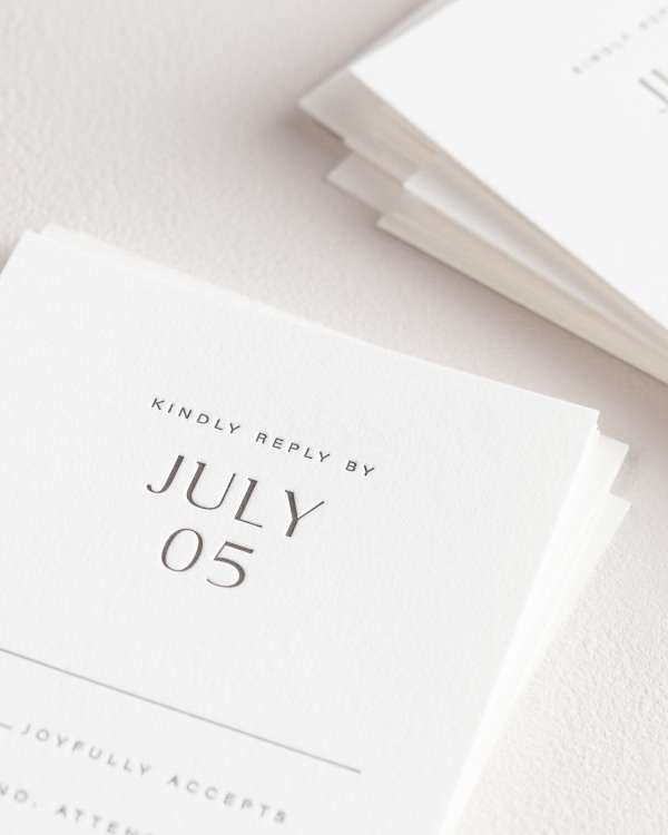 Dreamy close up shot of Naomi response cards. Deep impressions in the paper are a result of the letterpress printing process.