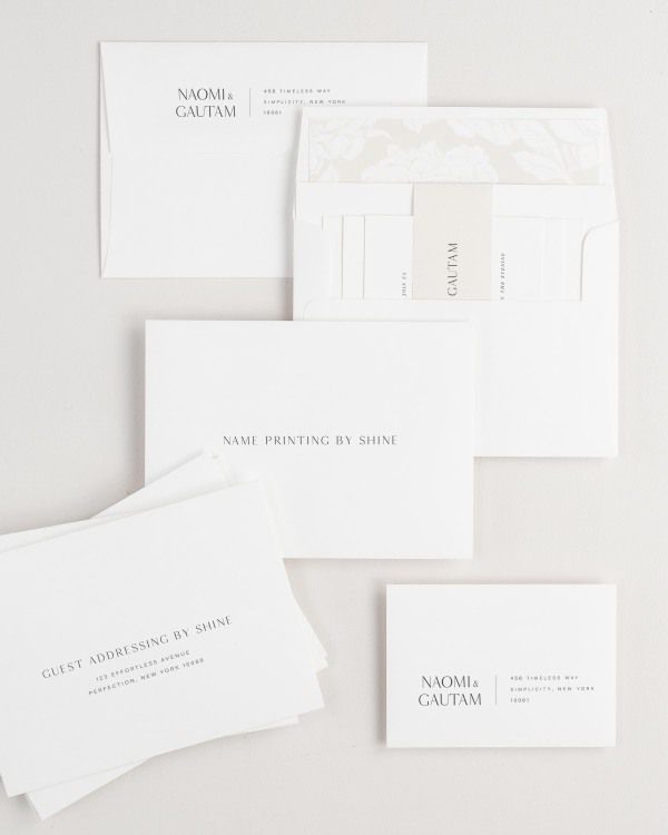Naomi wedding invitation envelopes with guest addressing, return addressing, and name printing services. Inner envelope features a blooms liner and nude belly band.