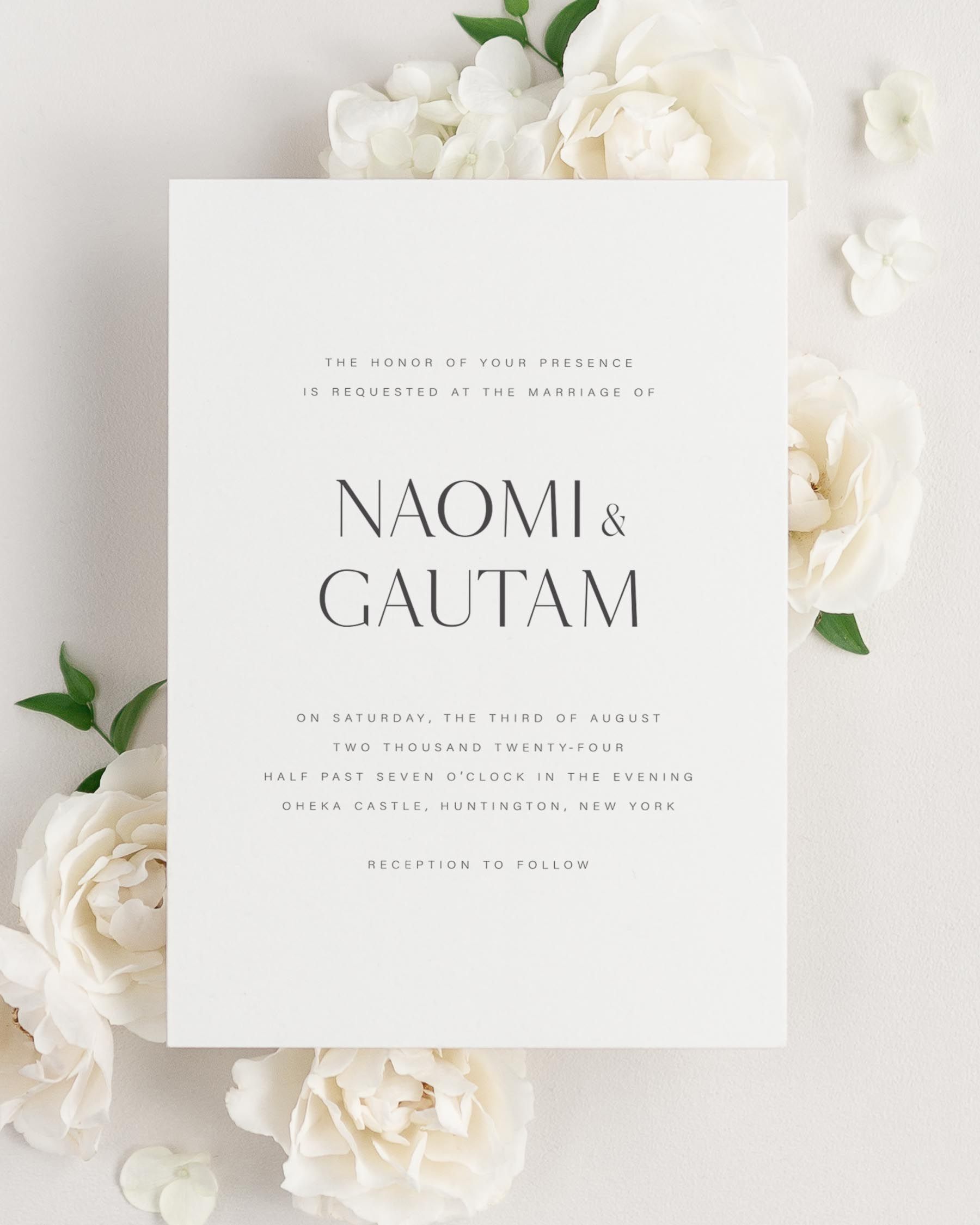 Naomi wedding invitation framed with dreamy florals.
