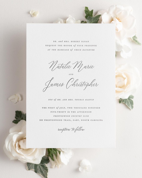 Natalie letterpress wedding invitation styled with pretty florals.