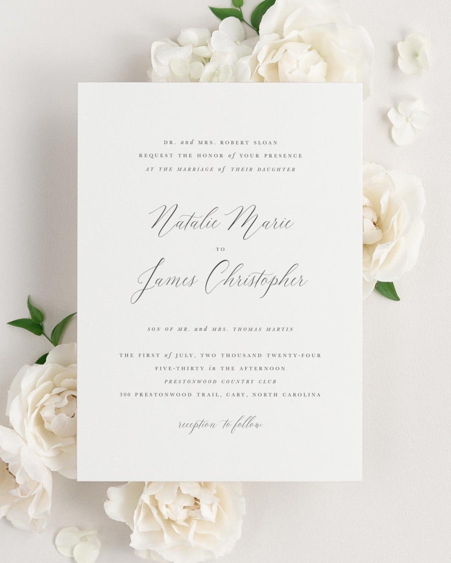 Natalie wedding invitation framed with dreamy florals.