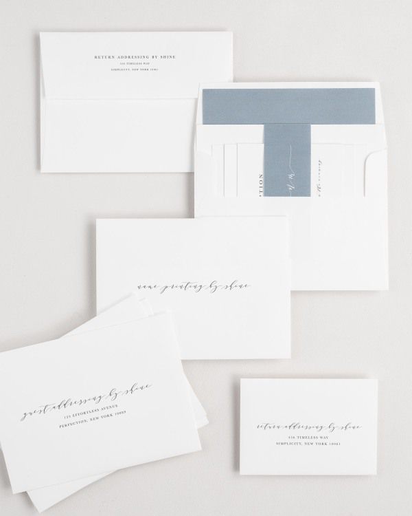 Nicole wedding invitation envelopes with guest addressing, return addressing, and name printing services. Inner envelope features a solid liner and mineral belly band.
