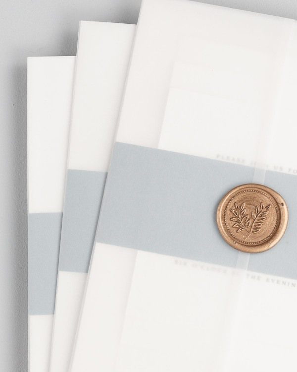 Wedding invitations with vellum jacket and wax seal
