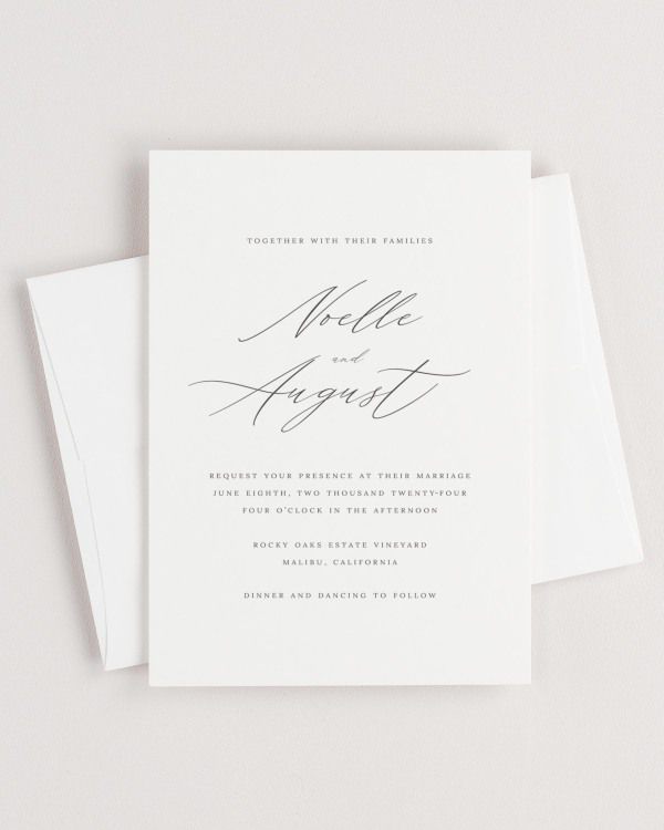 Simple close-up of Noelle invitation with an envelope.