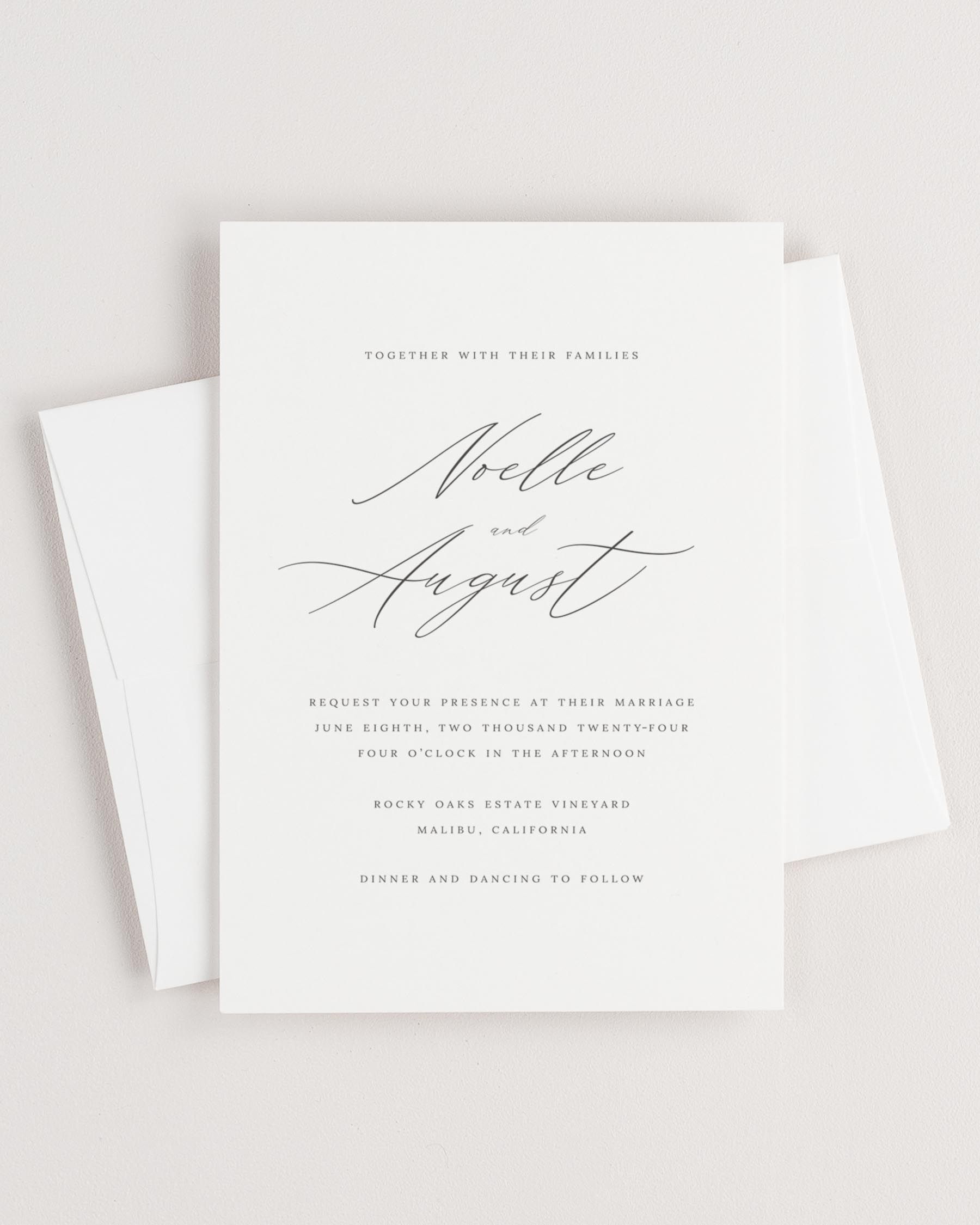 Simple close-up of Noelle invitation with an envelope.