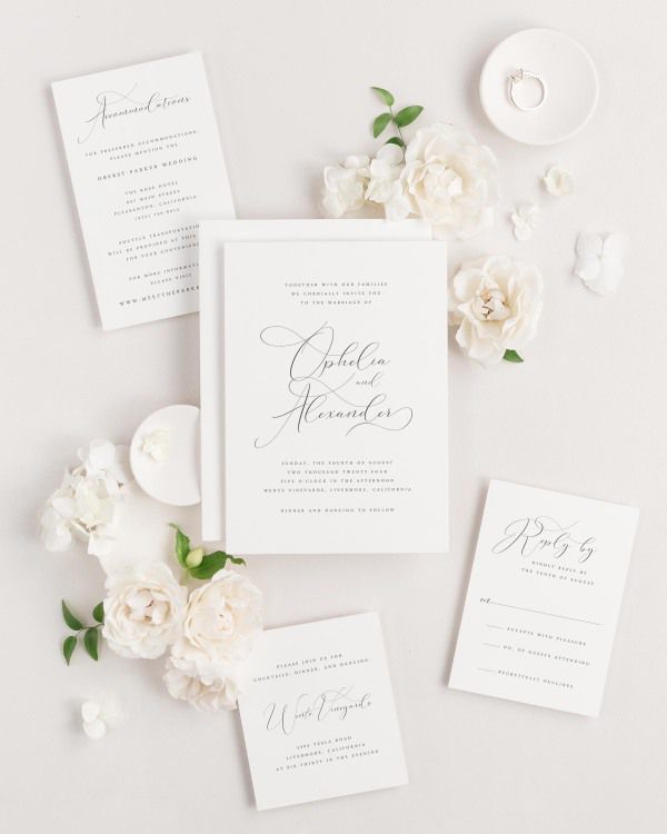 Ophelia wedding invitations flat lay with