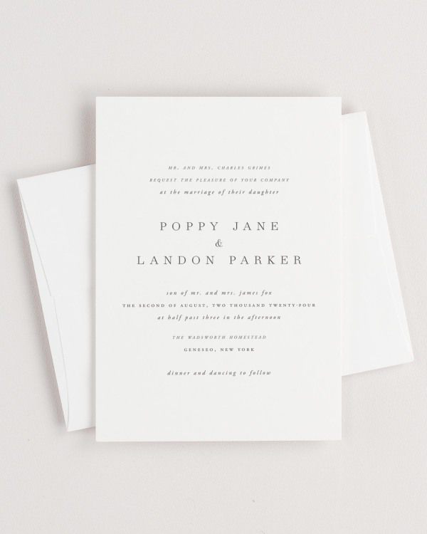 Simple close-up of Poppy invitation with an envelope.