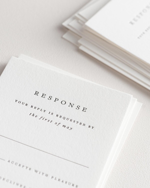 Dreamy close up shot of Priya response cards. Deep impressions in the paper are a result of the letterpress printing process.