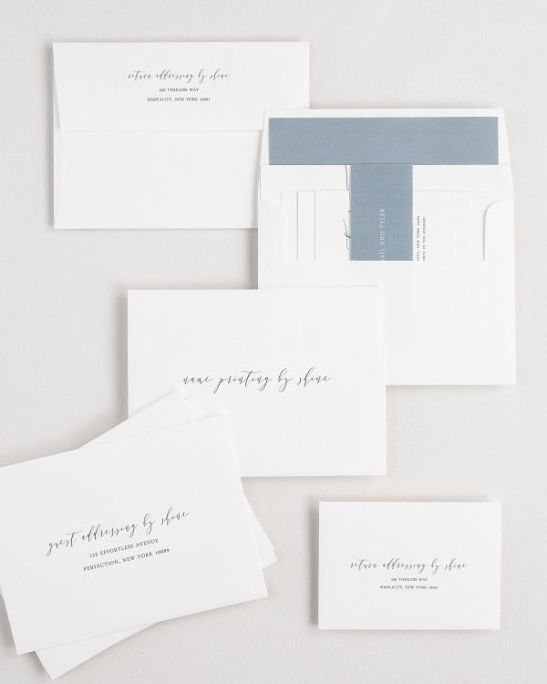 Romantic Calligraphy wedding invitation envelopes with guest addressing, return addressing, and name printing services. Inner envelope features a solid liner and mineral belly band.