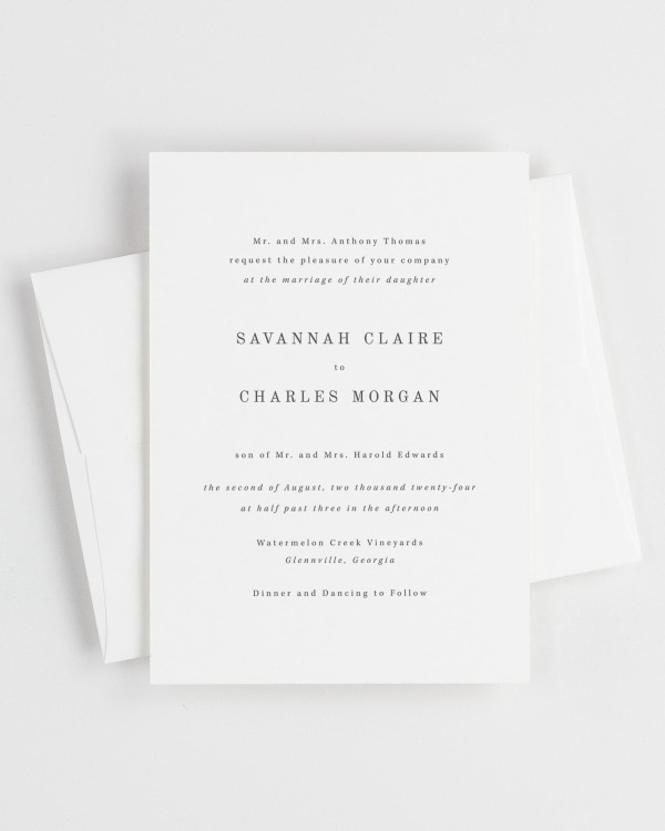 Simple close-up of Savannah invitation with an envelope.