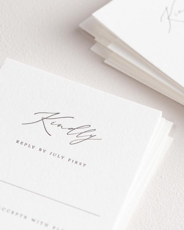 Dreamy close up shot of Sienna response cards. Deep impressions in the paper are a result of the letterpress printing process.