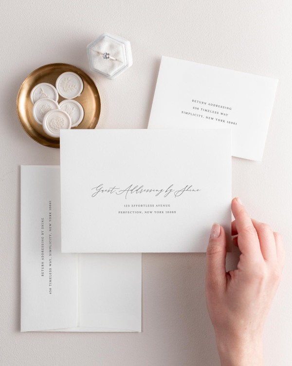 Sienna letterpress wedding invitation envelopes. The response envelope showcases our return addressing service, while the outer envelopes shows both guest and return addressing options.