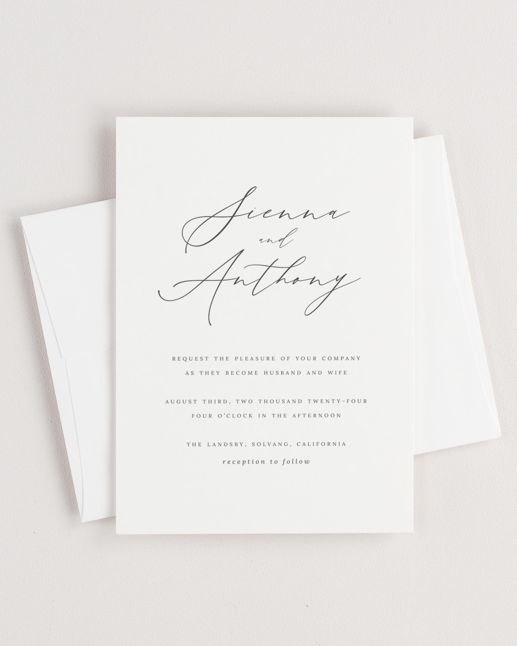 Simple close-up of Sienna invitation with an envelope.