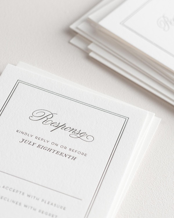 Dreamy close up shot of Simply Classic response cards. Deep impressions in the paper are a result of the letterpress printing process.