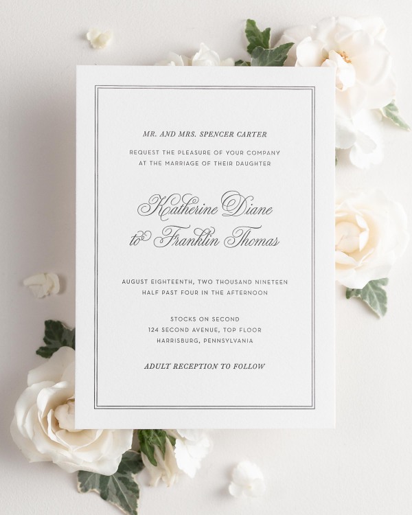 Simply Classic letterpress wedding invitation styled with pretty florals.