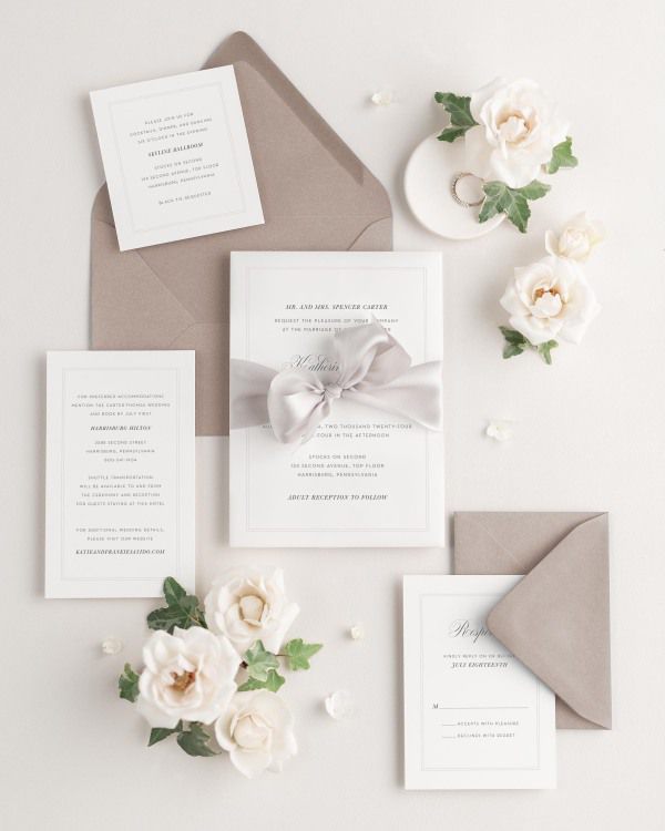 Wedding invitations with silk ribbon and light brown envelope