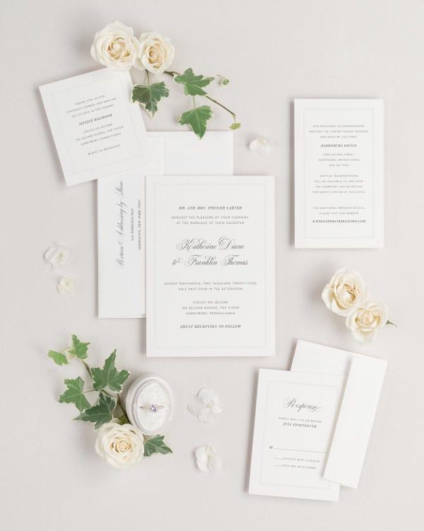 Simply Classic wedding invitations flat lay with