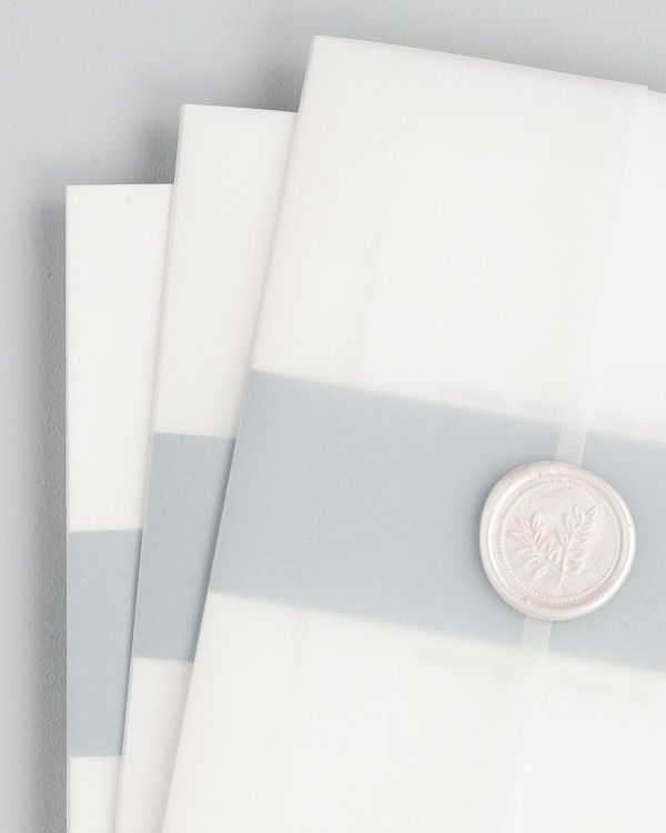 Wedding invitations with vellum jacket and wax seal