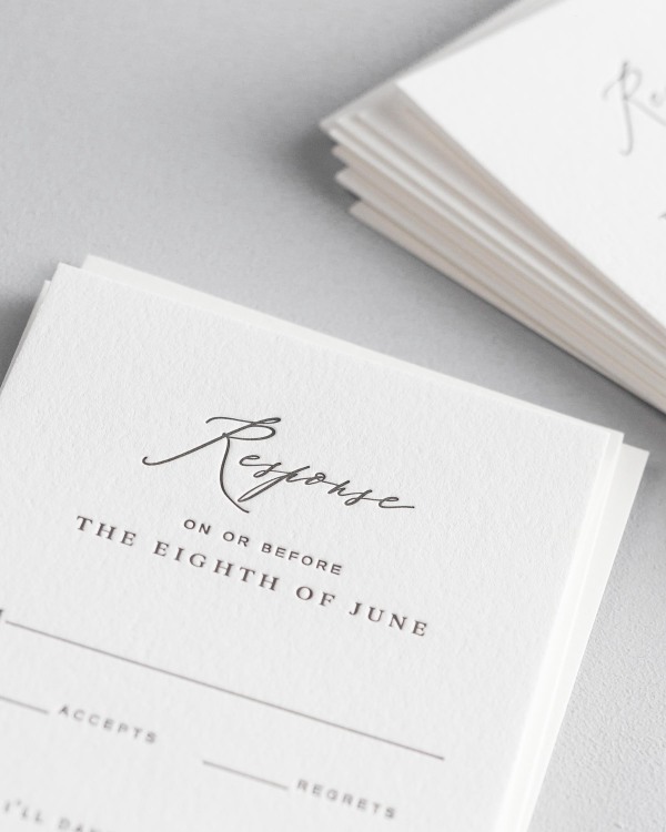 Dreamy close up shot of Sophia response cards. Deep impressions in the paper are a result of the letterpress printing process.