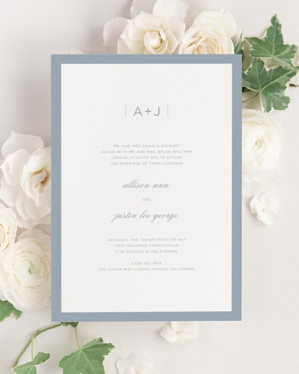 Sophisticated Modern wedding invitation framed with dreamy florals.