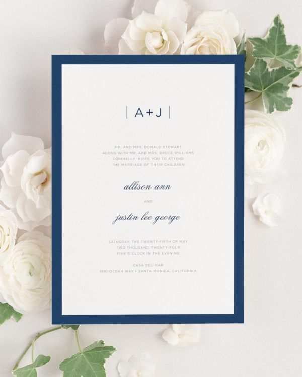 Sophisticated Modern wedding invitation framed with dreamy florals.