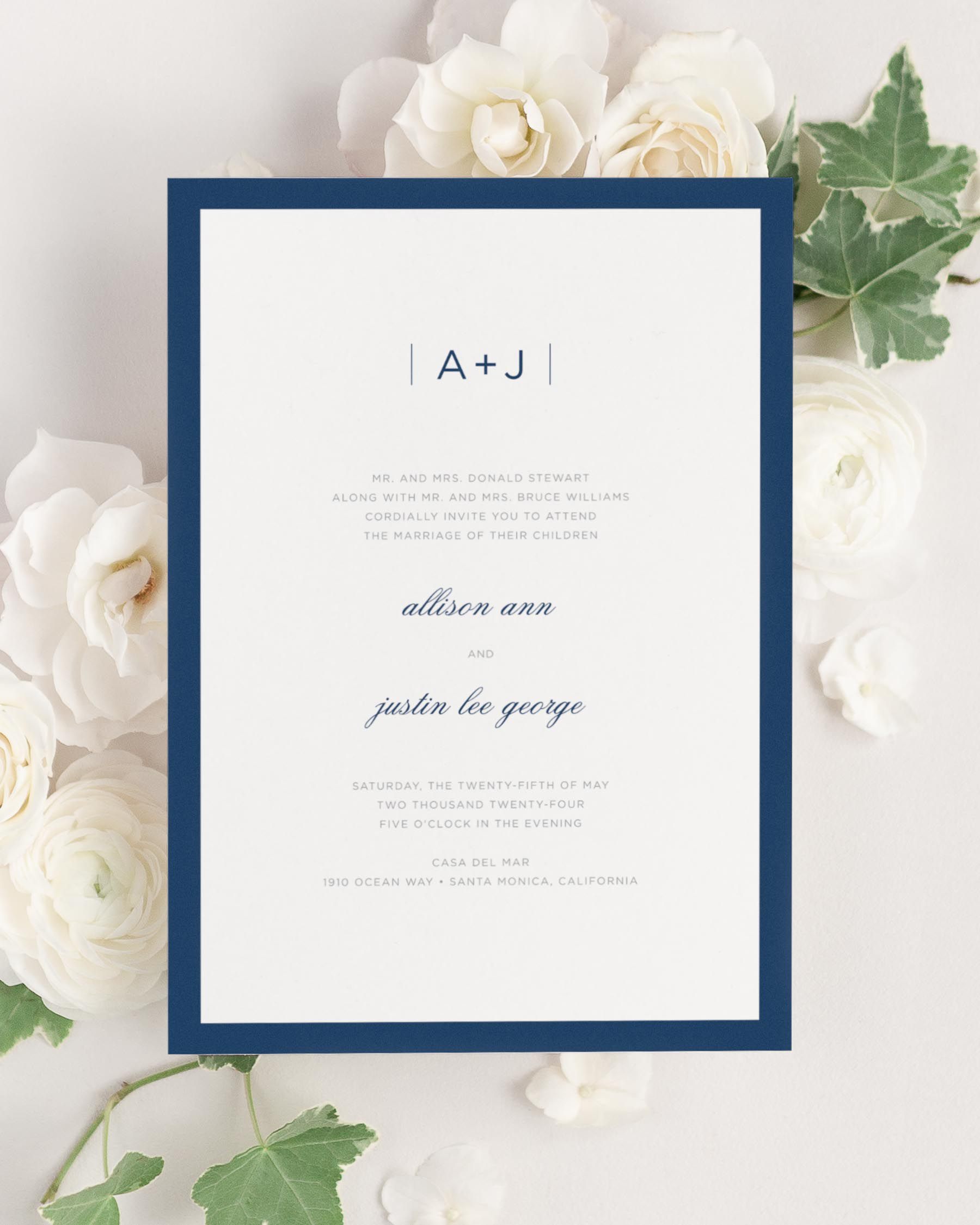 Sophisticated Modern wedding invitation framed with dreamy florals.
