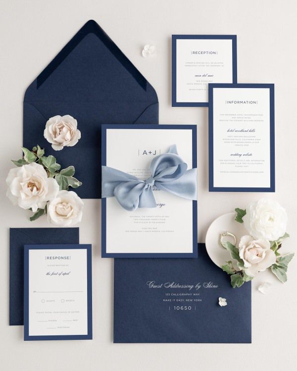 Wedding invitations with silk ribbon and navy envelope