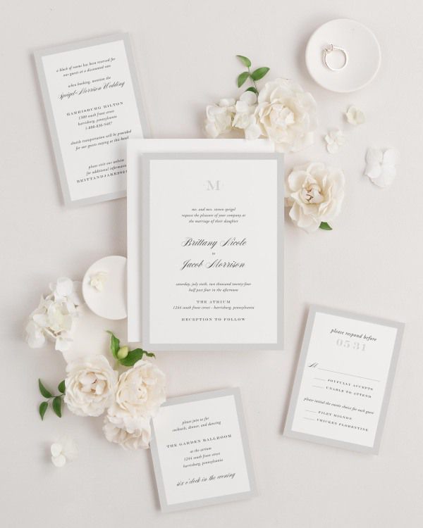 Upscale Monogram wedding invitation framed with dreamy florals.