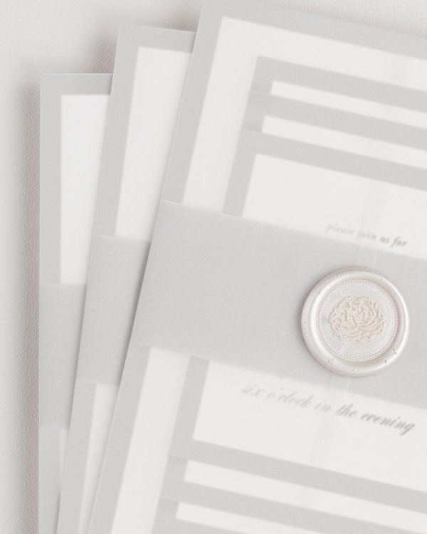 Upscale Monogram wedding invitation framed with dreamy florals.