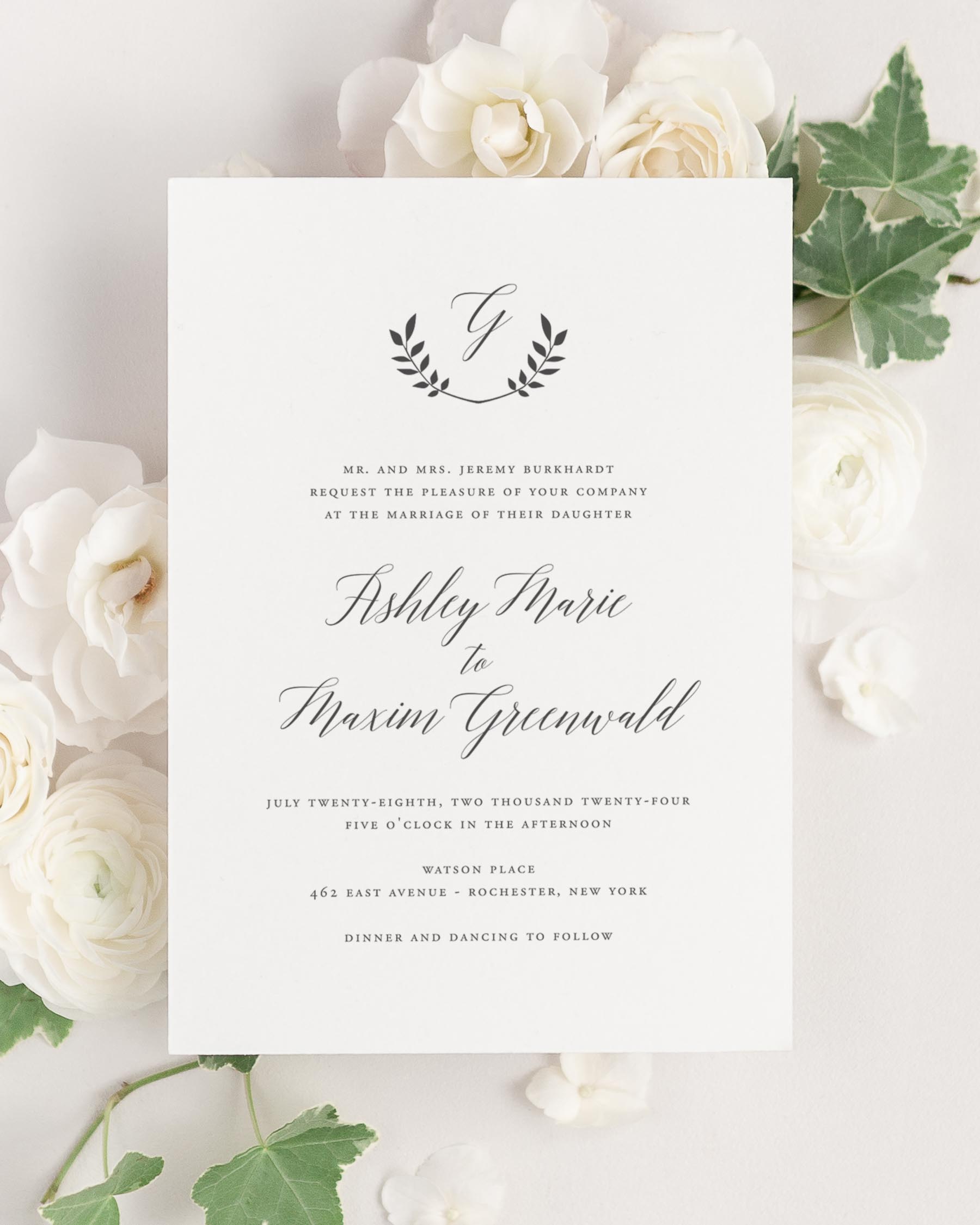 Wreath Monogram wedding invitation framed with dreamy florals.