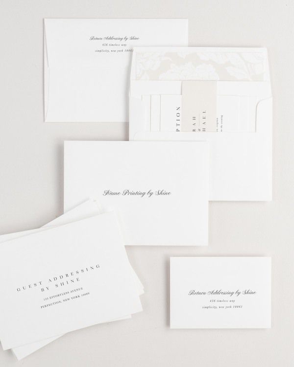 Zarah wedding invitation envelopes with guest addressing, return addressing, and name printing services. Inner envelope features a blooms liner and nude belly band.