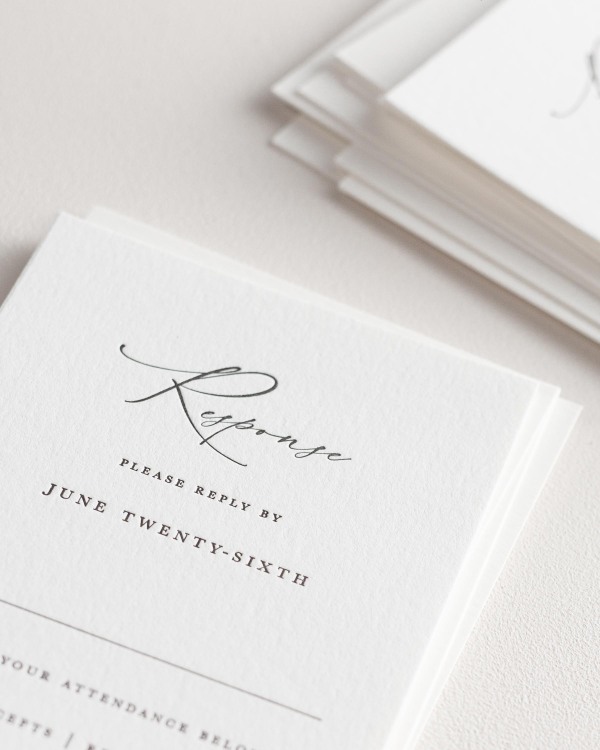 Dreamy close up shot of Zoey response cards. Deep impressions in the paper are a result of the letterpress printing process.
